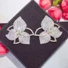 Les boucles d'oreilles étalon sont 8 élégantes fleurs de feuilles fleurs multicolores zircone cubique pave boucles d'oreille de fiançailles noix de soirée