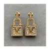 Designer de moda Gold Lock Diamond Brincos para mulheres Senhoras personalizadas de alta qualidade Aço inoxidável Brincos de joias de joias