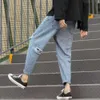 Jeans angustiados da rua Americana para a versão coreana masculina da moderna perna lisa de perna lisa pequena perna de 9 pontos de mendiga de 9 pontos calças