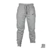 Męskie spodnie marka Jogging drukowana bawełniana joguflage Typ Mężczyzna moda Harem Ubrania Sprężyna i jesienne żebra Wysoka jakość otufc