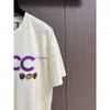Männer plus Tees Polos runde T-Shirt Plus Größe Kragen bestickter Druck Polarstil Sommer Fruchtmuster Lila Buchstaben Logo bedrucktes Kurzarm T-Shirt 580