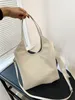 2024 Projektantka worek brązowa torba pętli plażowa biała torba sprzęgła P Mini Tote Bag