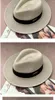 Vår- och sommarjazzhatt stråhatt män och kvinnor handvävd växtfiber ihålig halm hatt topp hatt sol hatt pastoral strand andas justerbar bred kant 7cm