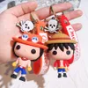 CRATION CARTON CUTE CUTE PIRATE KEYCAIN مع العديد من مفاتيح الدمى ، سلاسل المفاتيح القلادة