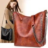 Sac vintage femmes rivet épaule grande capacité patchwork seau femelle crossbodybag handbag de qualité cuir shopper sacs