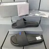 Sólido de diseño de goma Sándalo deslizante Tacón plano Zapatillas de lujo para mujeres zapatillas para hombres en el aire libre Sandale Sandale Beach Shopror Mule Sliders Sliders Sliders Sliders