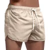 Homem shorts calças de verão surfando na primavera de primavera e praia shorts masculinos masculino de traje de banho curto basquete gry wor
