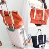 Bags JXSLTC New Fashion canvas Travel Folding duffel Bags Pouch WaterProof Unisex Travel Handbags Women hand Luggage Travel Bag