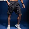 Męskie szorty z kieszeniami zamków błyskawicznych trening na siłownię Mężczyźni sportowe trening piłkarski krótkiej koszykówki tenisowej 1 240416