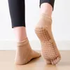 Vrouwen sokken winter vaste kleur unisex dikke dans yoga vijf vinger niet-slip kousen sportfitness