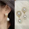 20STYLE Les dernières boucles d'oreilles de goujon à arc de perle de grande classe