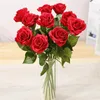 Dekorativa blommor Enkelkänsla fuktgivande Rose Artificial Flower Wedding Supplies Iiving Room Decoration Shooting Props Fake Wholesale