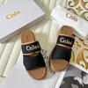 Sandals Designer Luxury Woody Clogs Mule Sandales plates Sandales à glissades Locs de pantoufles roses Permeurs Summer Place Plateforme Canvas Herringbone Shoes