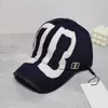 Créateur de mode Baseball Cap Street Hat Letter Golf Cap de golf Four Seasons Capeur Soleil Men's Duck Tongue Cap Letter Femme Poux de femme