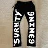 Black Casual Pants Men and Women Ins Letters Printed Cotton Y2k Hundred Sports Pants Street Style Loose Pants 240403