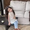 Set di abbigliamento bambine estate coreane da 2 pezzi abiti set senza maniche mobili floreali cavi top pantaloni da ricamo in pizzo si adattano a piccoli abiti