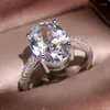 Küme halkaları ışıltılı 6 ct büyük oval kesim zirkon halkası ile mikro döşeli cz 925 Sterling Gümüş Kadınlar Moda Takı Kadın