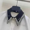 Camicette femminile camicie designer 2024 primavera primaverile nuovo stile alla moda e semplice contrasto con diamante fatto a mano diamante cucito camicia a metà lunghezza 9sq3