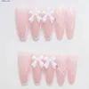 Faux ongles 24 pcs une boîte de thé au lait papillon diamant ongles roses portant des plaques de ongles diy faux ongles y240419 y240419