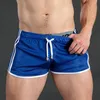 Sports de secado rápido para hombres Entrenamiento de fitness gimnasio Mesh casual de la playa suave y transpirable pantalones cortos ropa 240412
