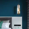 Ljuskronor rökig grå bärnsten långt glas sovrum sovrum lampor minimalistisk nordisk heminredning vardagsrum matbord ljuskrona