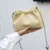 Liten Cowhide och Versatile Womens Bag Single Shoulder Crossbody Golden Ball Chinese Style Simple Fashionable dragkedja Dumpling