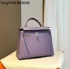 Handtasche 7a Frauen handgefertigt Strauß Haut Lavendel lila Bag 25 cm Premiumbeutel Silberknopf Hand genäht