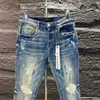 lila varumärkesjeans 2024 Nya designer jeans för kvinnor och män trendiga modebyxor hiphop män jeans orolig rippad cyklist smal fit motorcykel denim för män