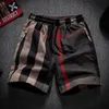 summer mens luxury brand lattice trend high end loose beach casual shorts 240409