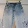 Jeans feminino pesado indústria borboleta bordada shinestone 2024 primavera e verão alta cintura fenda esticada calça calças mulheres