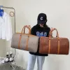 Bolsas bolsas de viaje con ruedas para mujeres PU cuero de cuero gran capacidad bolsas de duffel equipaje femenino y bolsos para damas bolso de lona 2022