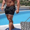 Man shorts fiess strand sport shorts heren mannen zomer sportscholen training man mannelijke ademende gaas snel droge sportkleding jogger short broek mannen rennen man