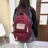 Rugzakken nieuwe middelbare school rugzak grote capaciteit grote capaciteit heren en dames reiscreëren backpack Koreaanse versie van studentencomputerscomputer tas
