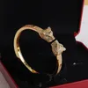 Pulsera de oro de lujo Cabeza de tigre para mujer Arpletas de brazaletes para hombres Diamantes Diseñador de diamantes Joyas Damas Cualquier situación Accesorios clásicos con caja