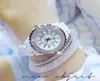 Surveillez les femmes de luxe Diamond Dames Watchs Fashion White White Ceramic Strap Rhinage Quartz Bracelet Wrists8999211