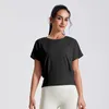 Chemises actives Femmes Loose Yoga Shirt Short Sports Sports Side Pleas Workout Running Top Sexy Gym Wear Push Up Exercice