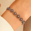 سلسلة Wanzhi New Retro Hollow Flower Bracelet للنساء التصميم الإبداعي المصنع المعدني المعدني المجوهر