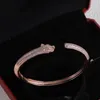 Pulsera de oro de lujo Cabeza de tigre para mujer Arpletas de brazaletes para hombres Diamantes Diseñador de diamantes Joyas Damas Cualquier situación Accesorios clásicos con caja