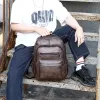 バックパック高品質のUSB充電バックパックメンズPUレザーバグパックラージラップトップバックパックティーンエイジャーの男の子のための男性モキラスクールバッグ