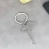 Keychains Nedar rostfritt stål kvinnlig kropp hänge nyckelring för kvinnor män abstrakt konstnärlig form charm nyckel kedja gåva smycken