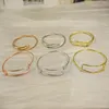 Bangle 2024 Модный роскошный сложенный ткацкий браслет из нержавеющей стали с раздвижной ручкой и уникальной цепной связью