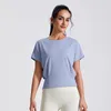 Chemises actives Femmes Loose Yoga Shirt Short Sports Sports Side Pleas Workout Running Top Sexy Gym Wear Push Up Exercice