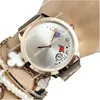 New Brand Wrist Wistr pour les femmes Flower Style Flower Steel Metal Band Quartz Watches Tom 27 322F