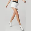 アクティブなショーツLo Yoga Tennis Dress Short Skirt快適な滑り止め裸のクイックドライブレーニング可能なゆるいカジュアルスポーツポケット付き