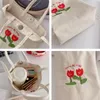 Bolsas de ombro Canvas Totes Bolsas e bolsas para mulheres 2024 MODAS MENHINAS COMPRIMENTAS FECIMENTOS DE PROMUTO DE ESTRIMEIRA DE ESTIMAGEM CRESSBIOL