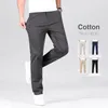 Pantaloni maschili in cotone elastico elastico classico casual classico business di colori dritti di quattro stagioni vestiti di marca nero kaki grigio