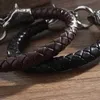 Chain Retro Punk Wolf Head Bracelet Black Woven Leather Wristband Suitable for Mens Fashion Personality Pendant Buckle Jewelry Y240420