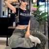 T-shirt féminin 2024 Tshirt pour femmes harajuku y2k imprime kawaii bébé ts été egirl crop tops slim des années 2000 tops strtwear noir goth short slve tshirts s-5xl y240420