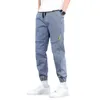 Męskie spodnie 2024 Długość strzyżki dżinsy jasnoniebieskie mody swobodne bawełniane szczupłe dżinsowe spodnie koreańskie spodnie męskie tkaniny marki