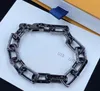 Luxury Black Chain Armets pojkvän Presentmärke smycken halsband Dainty Flower Charm Youth Chain Armband Designer Men kubansk ren titan rostfritt stålkedja